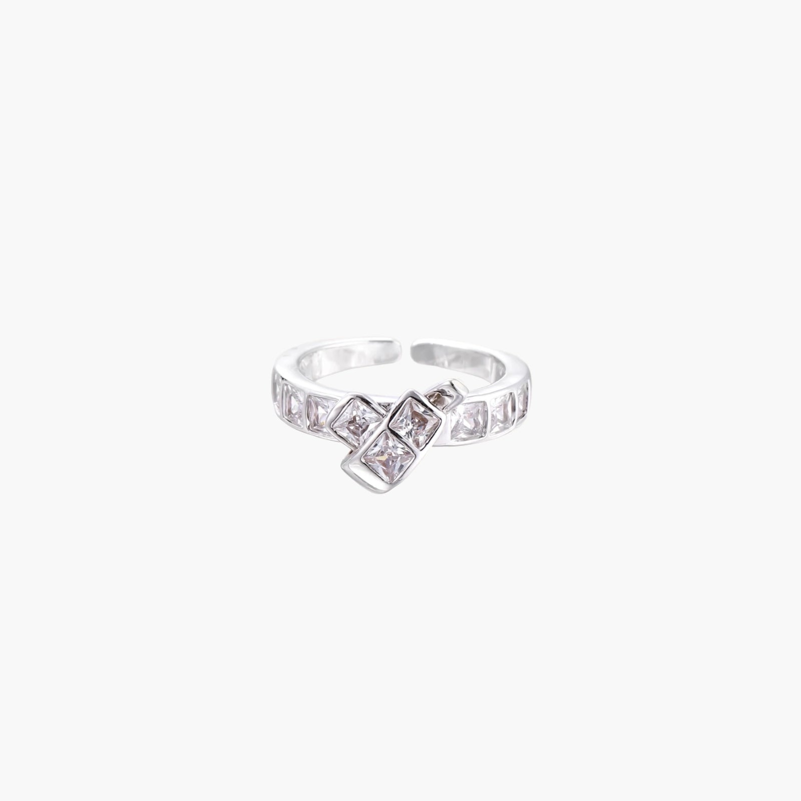 White gold plated adjustable ring featuring offset square cubic zirconia stones in an architectural stacked design